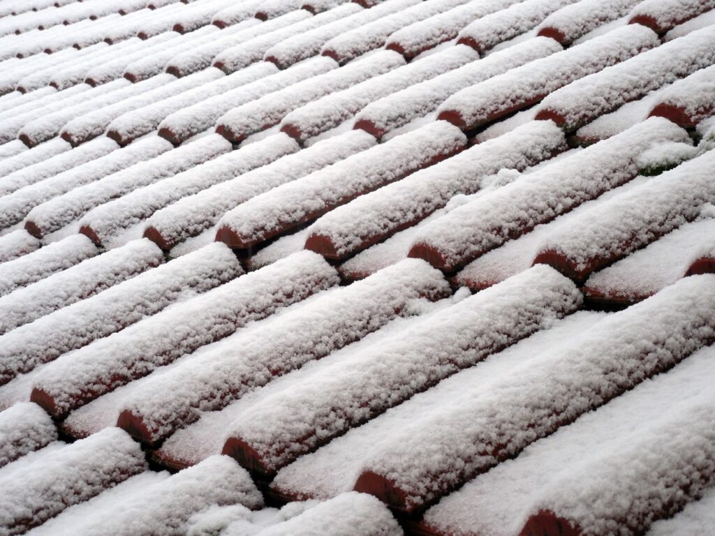 Snow Covered Tile Roof